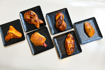 Traditional Turkish cuisine. Pizza, pita, pidesi, sucuk, hummus, kebab. Many dishes on the table. Serving dishes in restaurant. Background image. Top view, flat lay