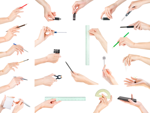 Hands holding office, stationery, writing and education theme items set. Isolated with clipping path