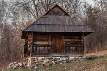 Fototapeta na wymiar Old traditional wooden house in Pirogov museum, Ukraine. log cabin