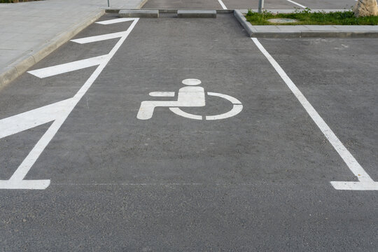 Parking Space For People With Musculoskeletal Disabilities, Adaptation And Traffic Signal