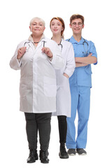 Group of successful doctors standing together isolated over white background