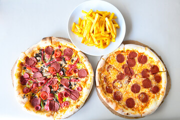 Traditional Turkish cuisine. Pizza, pita, pidesi, sucuk, hummus, kebab. Many dishes on the table. Serving dishes in restaurant. Background image. Top view, flat lay