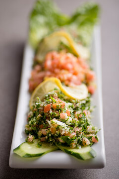 taboleh served in dish isolated on grey background top view of arabic food