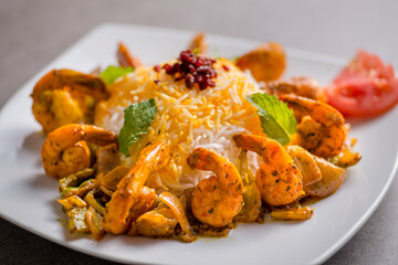 maygu karafs or shrimp biryani rice served in dish isolated on grey background top view of arabic food