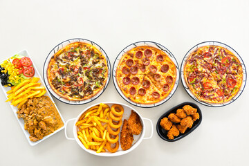 Traditional Turkish cuisine. Pizza, pita, pidesi, sucuk, hummus, kebab. Many dishes on the table. Serving dishes in restaurant. Background image. Top view, flat lay