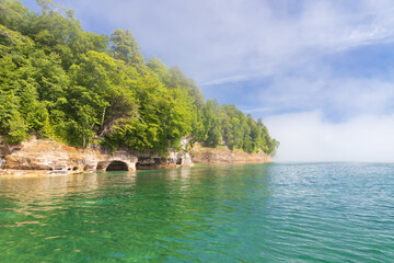 Fototapeta na wymiar Natural arches and sea caves along Lake Superior at Pictured Rocks National Lakeshore