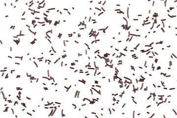 Chocolate sprinkles texture, granules isolated on white, top view 