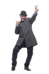 emotional man in a hat and autumn coat .