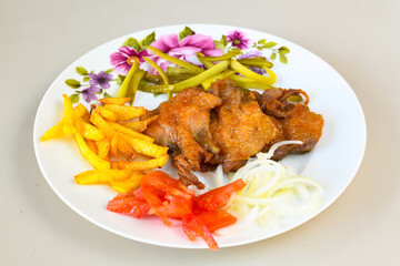 Fried Chicken breast hot crispy strips crunchy chicken tenders  isolated on white background.Nuggets isolated on white background on a plate