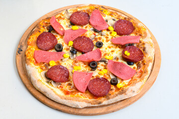 Delicious mixed pizza with rich content. Menu concept of choice and diversity. Karisik pizza