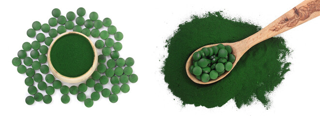 Spirulina algae powder and pills in wooden spoon isolated on white background. Top view