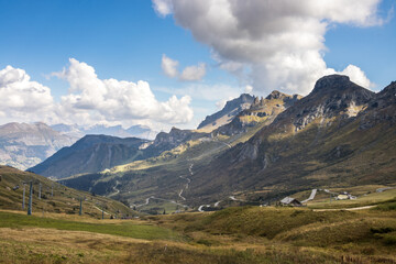 Naklejka premium Clouds over Selle Pass in Dolomites