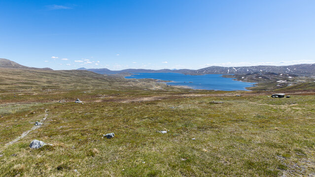 Panoramic view of a norwegian mountain landscape with the view Vinstre on a summer day