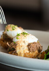 eggs benedict with meat