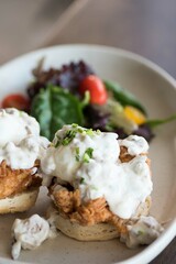 Eggs benedict and salad