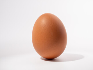Chicken eggs on a white background. Brown egg on a white background.