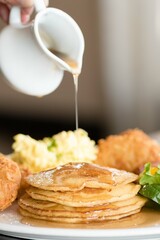 stack of pancakes with syrup
