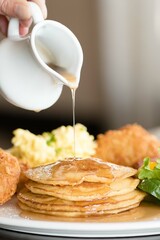 stack of pancakes with syrup