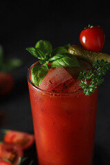 A glass with cold bloody mary cocktail