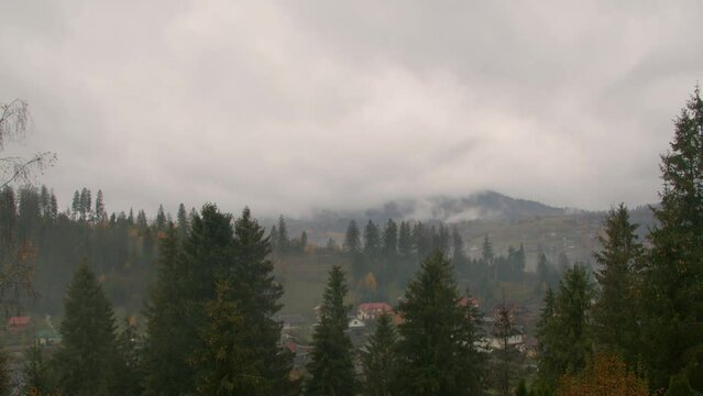 autumn carpathians, slavske, western ukraine, timelapse in the mountains, clouds and fog fly by quickly.