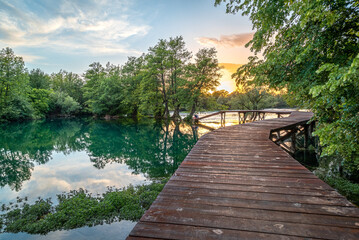 wooden bridge over the river