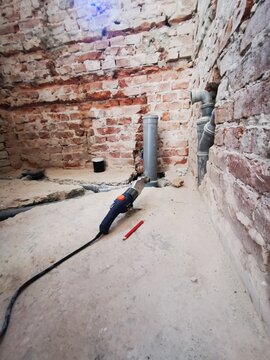 Bathroom water and drain pipe installation structure in the wall. Home repair and renovation.