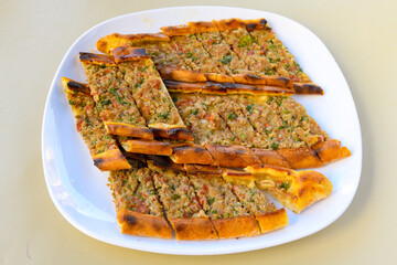 Kiymali pide. Turkish pide with minced meat. Turkish pizza mince pita Pide on white background. Etli ekmek. Kusbasili pide.