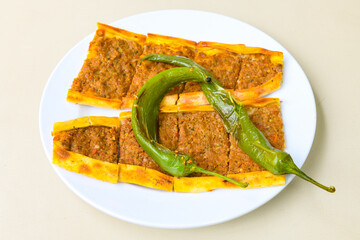 Kiymali pide. Turkish pide with minced meat. Turkish pizza mince pita Pide on white background. Etli ekmek. Kusbasili pide.