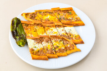 Kiymali pide. Turkish pide with minced meat. Turkish pizza mince pita Pide on white background. Etli ekmek. Kusbasili pide.