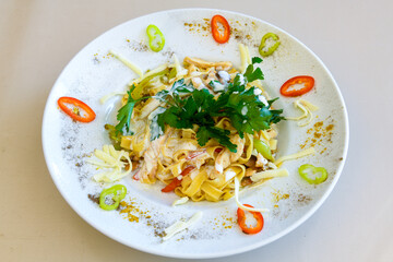 Macaroni Salad with red bell pepper, onion, celery, gherkins and mayonnaise dressing.Traditional...