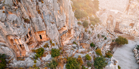 Ruins of ancient city Myra in Demre, Turkey Aerial Top view. Old tombs and amphitheater photo by drone