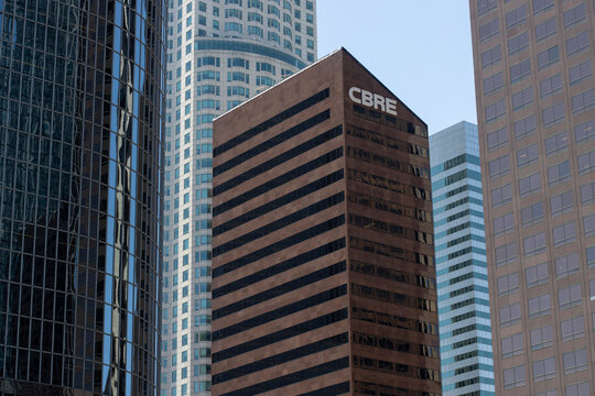 Los Angeles, CA, USA - May 11, 2022: CBRE logo is seen on 400 South Hope, one of an elite group of trophy buildings in the Downtown Bunker Hill district in Los Angeles, California.