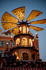 christmas decoration in Europe. Christmas fair at evening. Christmas atmosphere. old town hall.