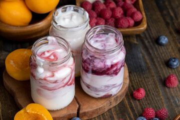 Fresh delicious yogurt made from milk with berry flavor