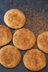 High angle view of snickerdoodle cookies with sugar and cinnamon spice on the surface; copy space