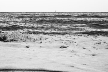Dramatic Ocean Waves Crashing on Rocky Beach, Black and White
