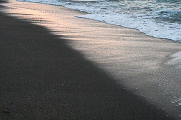 Sea Waves Breaking On A Sandy Beach