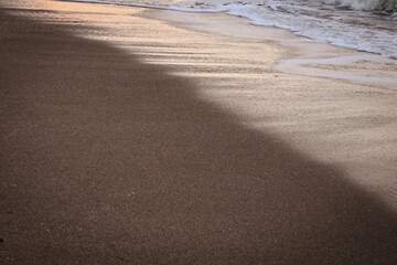 Sea Waves Breaking On A Sandy Beach