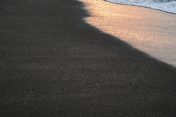 Sea Waves Breaking On A Sandy Beach
