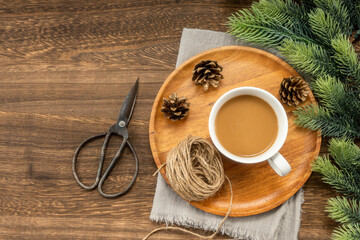 Christmas decorations and coffee on  wooden background. christmas concept.
