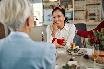 a cheerful family sharing love and surprises on Christmas