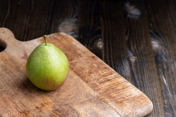 Whole ripe green pears, close up