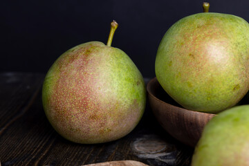 Whole ripe green pears, close up