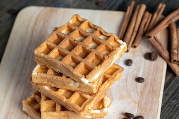 soft sweet waffles on the table, close up