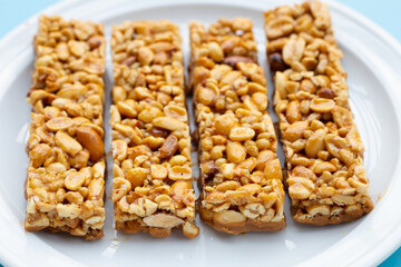Peanuts butter chocolate bars on white