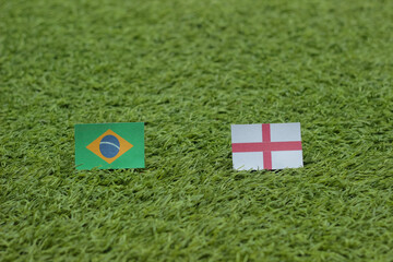 Leather soccer ball with international team flags of the participating countries in the championship tournament isolated on white background. Football equipment competitive game. World cup concept.	