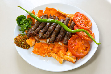 Meatball between bread (Turkish name : ekmek arasi kofte ) Izgara kofte. Manisa, Akcaabat, Akhisar  kofte
