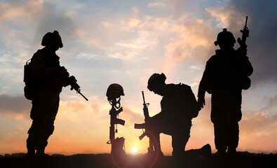 3D illustration of a military man kneeling in front of Fallen Soldier grave during sunset