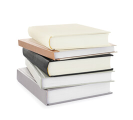 Many different books stacked on white background