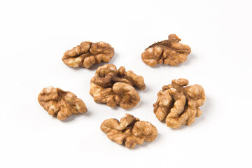 Walnut kernel isolated on white background.